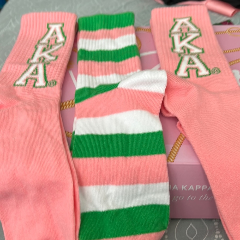 Three pairs of socks in Pink & Green. Never worn.